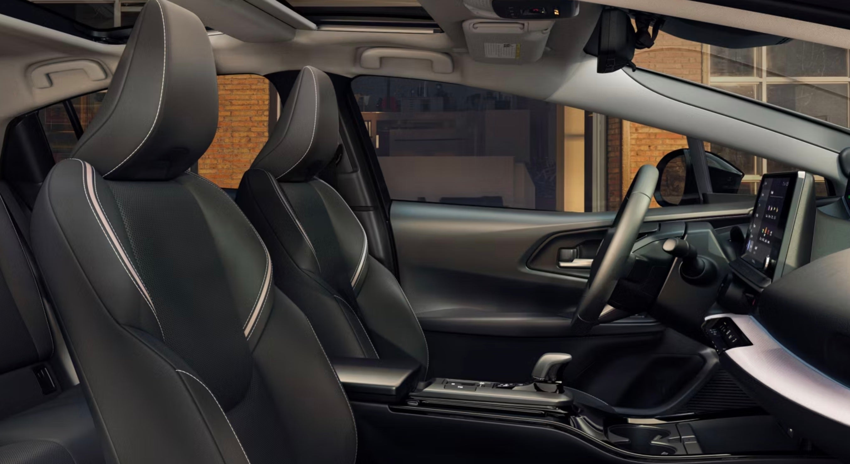 2026 Toyota Prius Limited AWD interior shown in Gradient Black SofTex® trim for sale near Newark